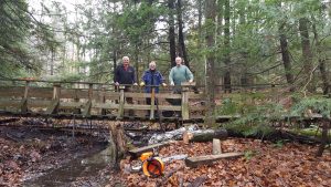 Alan, Karl, and Mike repairing a bridge at Grant’s Woods